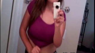 Busty legal age teenager playgirl shows her large meatballs whilst taking selfie