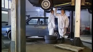 High class woman fucked by mechanics in garage